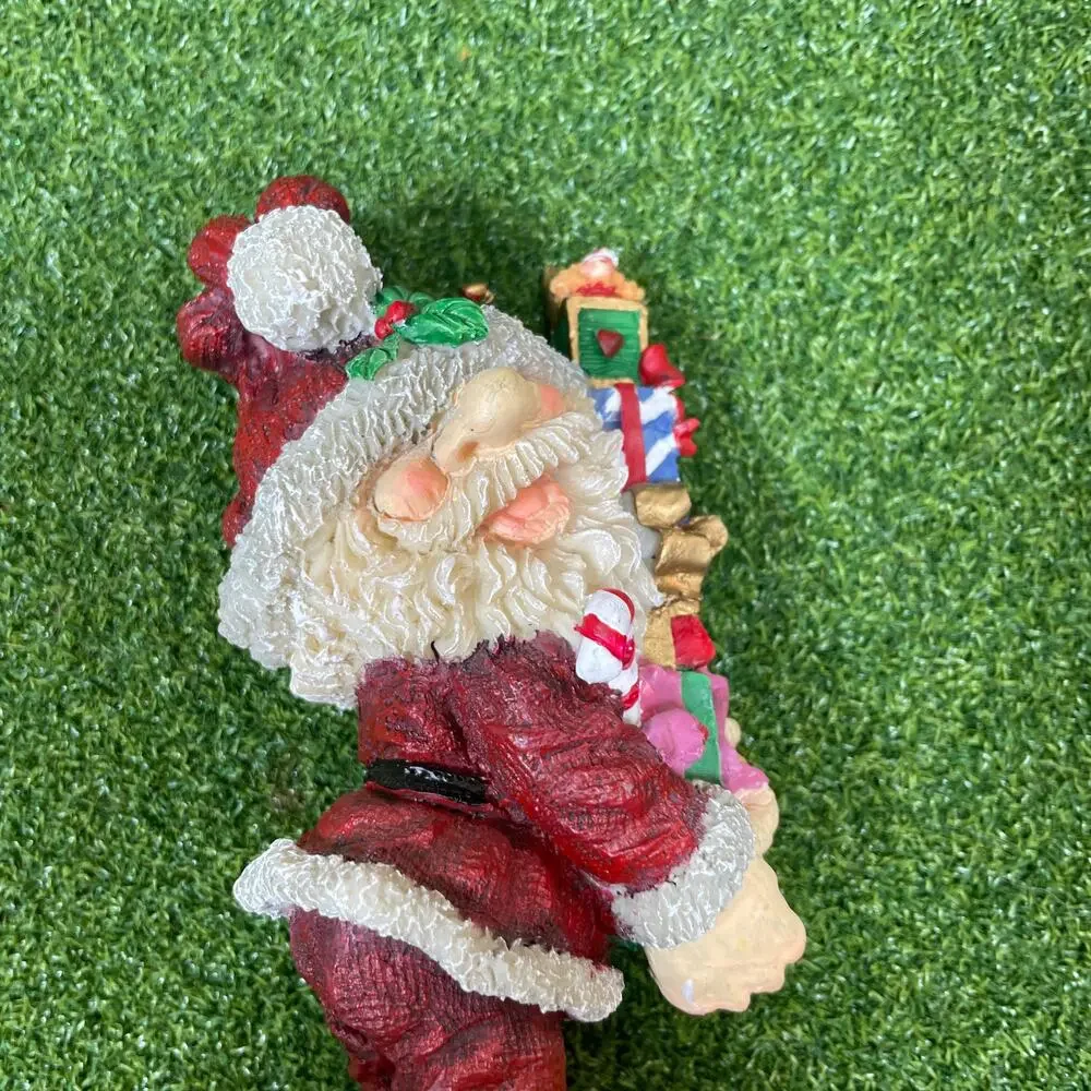 Resin Santa Holding Christmas Presents Figurine 9
